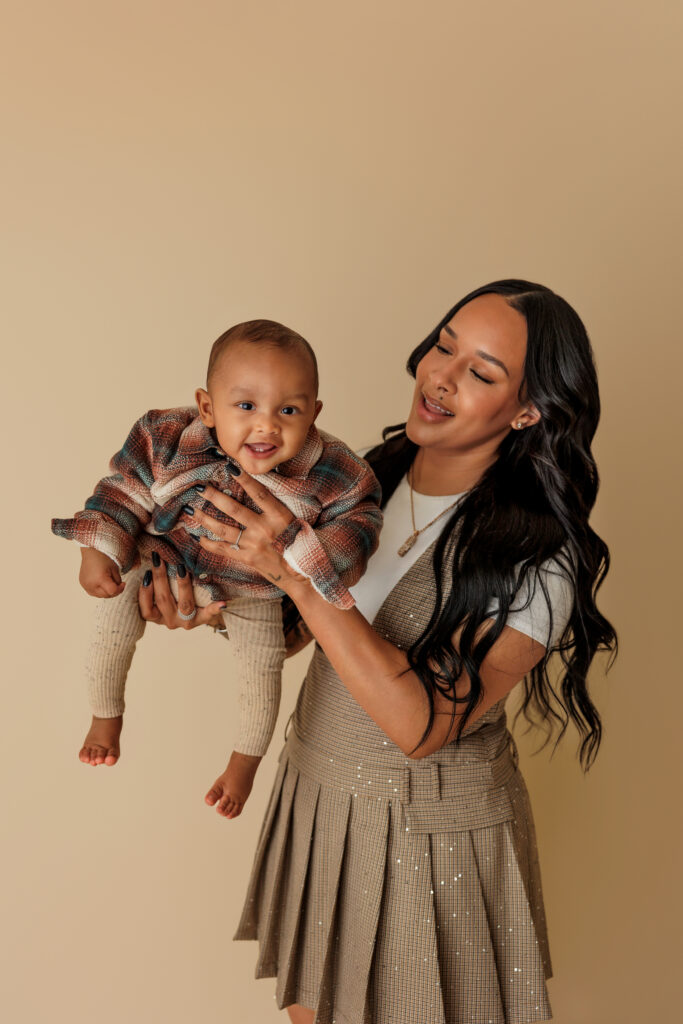 Chantel Christie-Jeffries holding baby during a photoshoot in North Hollywood, CA.